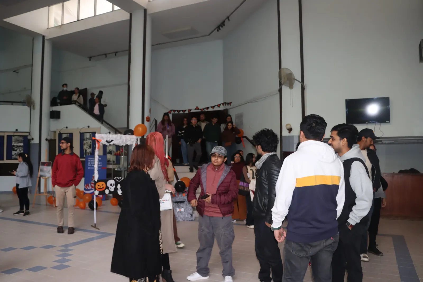 Guests in the decorated foyer between screenings